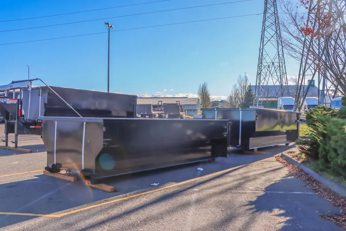 Roll-off dumpster ready for waste disposal at job site for 6 Yard Dumpster Rental in Cambridge